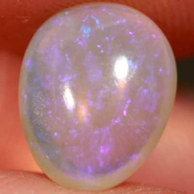 SOLID CRYSTAL OPAL Transparent with soft purple throughout